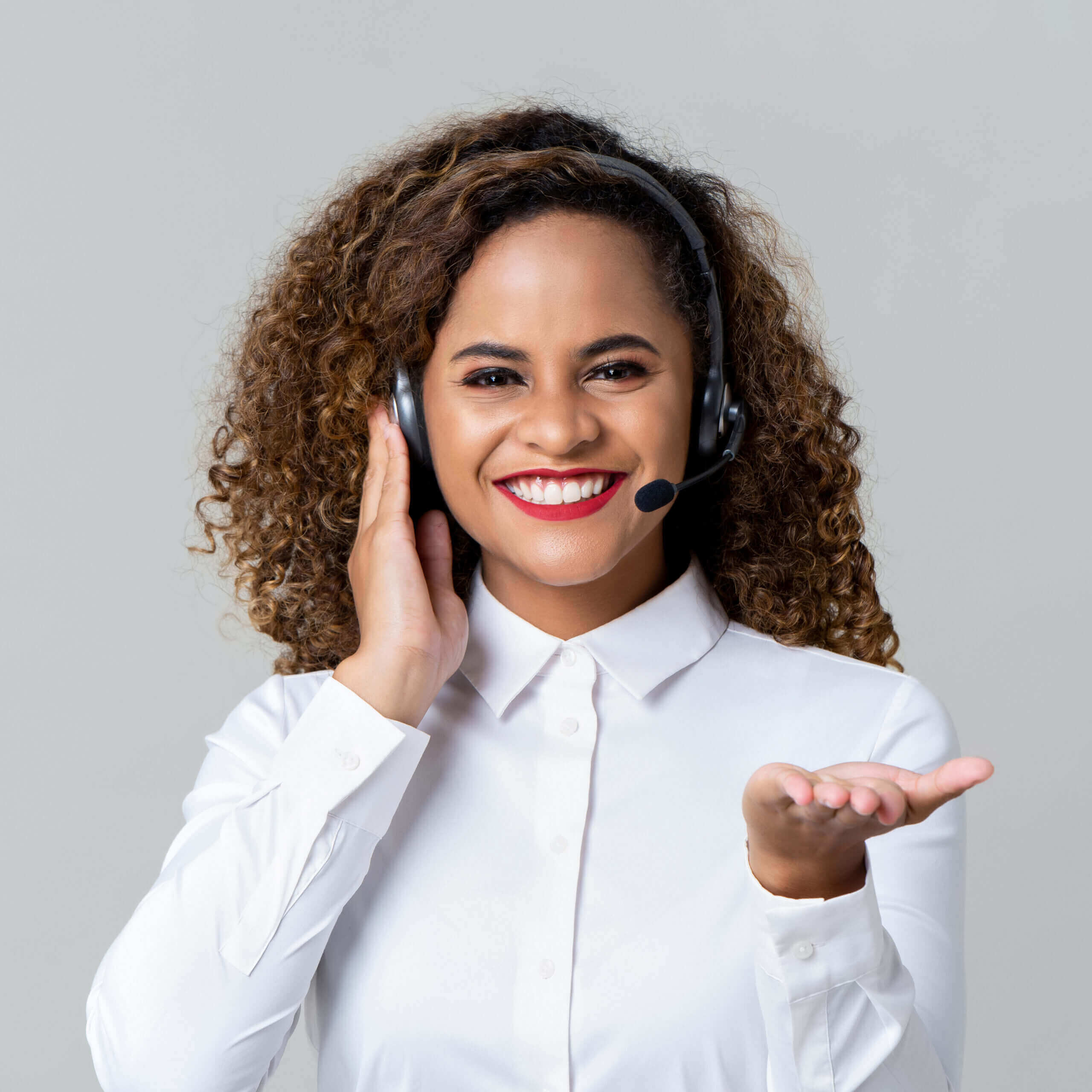 Smiling customer support agent with headset